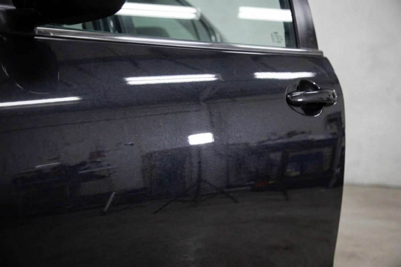 Paint correction removing swirl marks on car paint